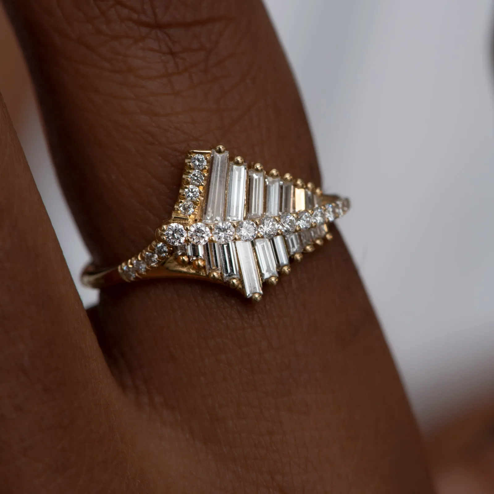 Asymmetrical Baguette Cluster Ring with Round Diamond Beams