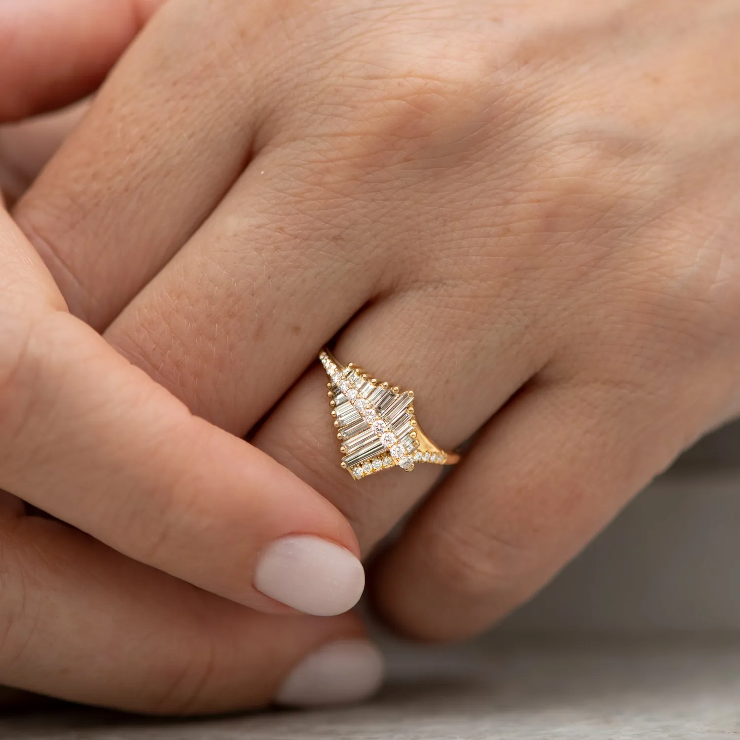 Asymmetrical Baguette Cluster Ring with Round Diamond Beams