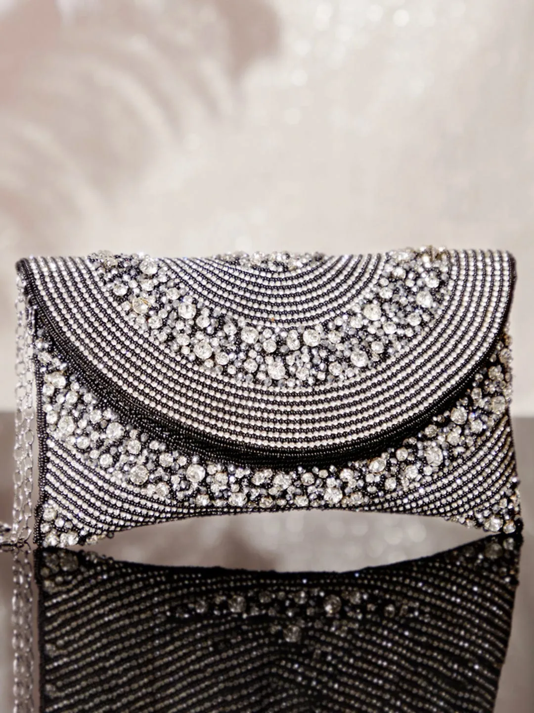 Rubans Black Colour Handbag With Embroided Silver Stone Design.