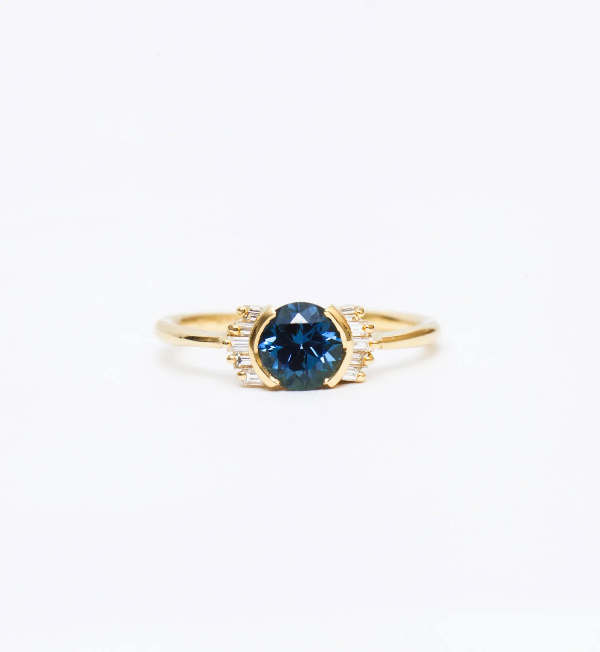 Teal Sapphire Ring with Diamond Frills